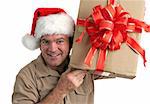 a Christmas delivery man shaking a gift and smiling as he tried to guess what's inside - isolated