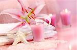 Pink soothing spa feeling with flower and pink candles