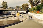 Drive onto the 101 Freeway from this entrance ramp in Los Angeles, California.  Advertising space is on the back of the pick up truck as well.