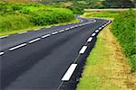 Empty winding country road in Brittany, France