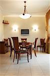 Table with fruit in a beautiful room