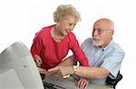 A senior lady teaching a senior man how to use the computer. He has a question.  Isolated on white.