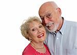 A happy senior couple who is young at heart.  Isolated with room for text.
