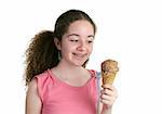 A teen girl with braces looking hungrily at an ice cream cone.
