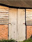 barn door on farm buildings made of wood