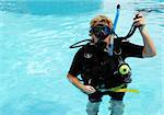 Scuba diver in the swimming pool.