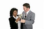 An attractive interracial couple toasting eachother with champagne.