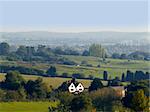 A view over countryside and farmland.