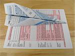Tax form paper airplane