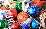 Colorful christmas bulbs, mask, beads and streamer