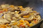 Mushroom and Vegetable Sauté with Steam and narrow depth of field.