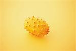 Horned Melon On Yellow Background