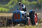 Agricultural Tractor ploughing a field