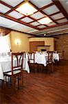 Lunch hall with a chandeliers in modern hotel