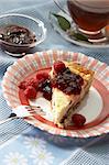 soft cheese pie with berry jam and raspberries