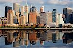 Lower Manhattan with water reflection in Hudson River.