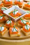 Delicious appetizers with smoked salmon and dille sauce.