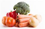 Group of raw vegetables on a white background