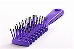 isolated violet hairbrush