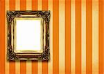 hollow gilded picture frame on retro background