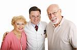 Senior couple posing in their new glasses with their optometrist.  Isolated on white.