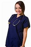 Pretty young woman healthcare worker wearing blue scrubs and a stethoscope standing on white