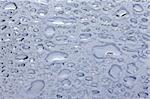 Macro Shot of Water Drops on Glass