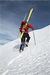 Winter mountaineering in wilderness area: male climber, exploring and adventure concept.