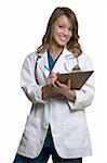 Female attractive doctor wearing white lab coat holding a clipboard with a stethoscope around shoulders smiling standing on white background