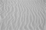 Beach with soft sand, rippled texture of windblown effect