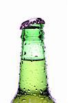 beer bottle with water droplets, green bottle closeup isolated on white