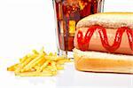 Hot dog, soda glass and french fries on white background. Shallow DOF