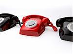 3d rendered illustration of red and black retro telefones