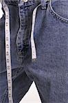 weight loss jeans with measuring tape belt