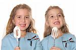 happy children eating frosting