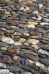 Abstract background of old medieval cobblestone pavement