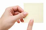 Female hand holding a note. Isolated on a white background.