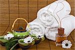 Aromatherapy, relaxing herbal tea and soft cotton towels in a spa