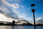 Sydney Harbour, Australia, with view of Sydney Harbour bridge and lamppost.