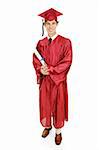 Handsome young graduate in his cap and gown holding his diploma.  Full body isolated on white.