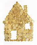 small house made out of gold coins