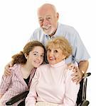 Portrait of loving grandparents and granddaughter.  Isolated on white.