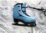 The image of the female skates in snow