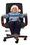 Happy boy waiting santa in a revolving armchair - studio shot - isolated