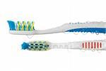 Two different toothbrushes on the white background