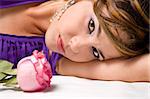 Portrait of young fashion woman with pink rose - isolated