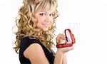 young friendly blond girl holding box with wedding ring