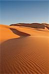 Erg Chebbi sand dunes in the Sahara Desert near Hassi Labiad and Merzouga, Morocco. Algeria is located 20 km from here.