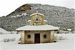 Hermitage in San Pantaleon de Losa with snow Slab