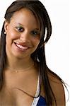 Head and shoulder portrait of an attractive young African American woman on white with a nice smile